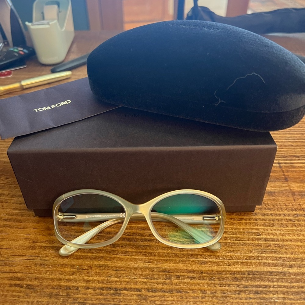 Tom Ford glasses with blue light lenses.